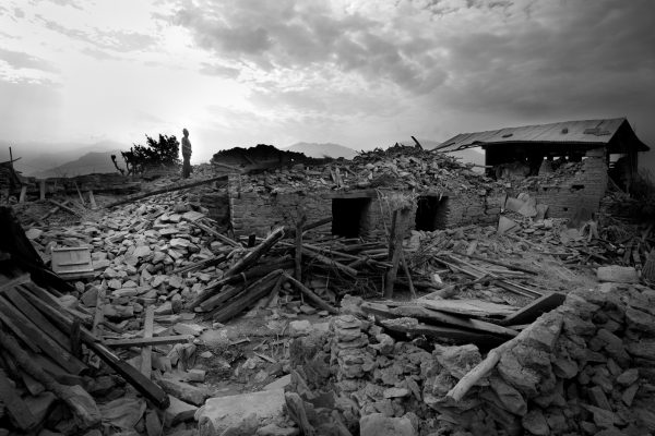 Gorkha resident stands alone and helpess. His family buried beneath his house following the twin 2015 Earthquakes in Nepal.